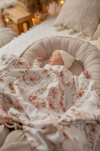 OEKO-TEX certified baby nest beige, newborn sleeping with floral muslin blanket, safe organic lounger