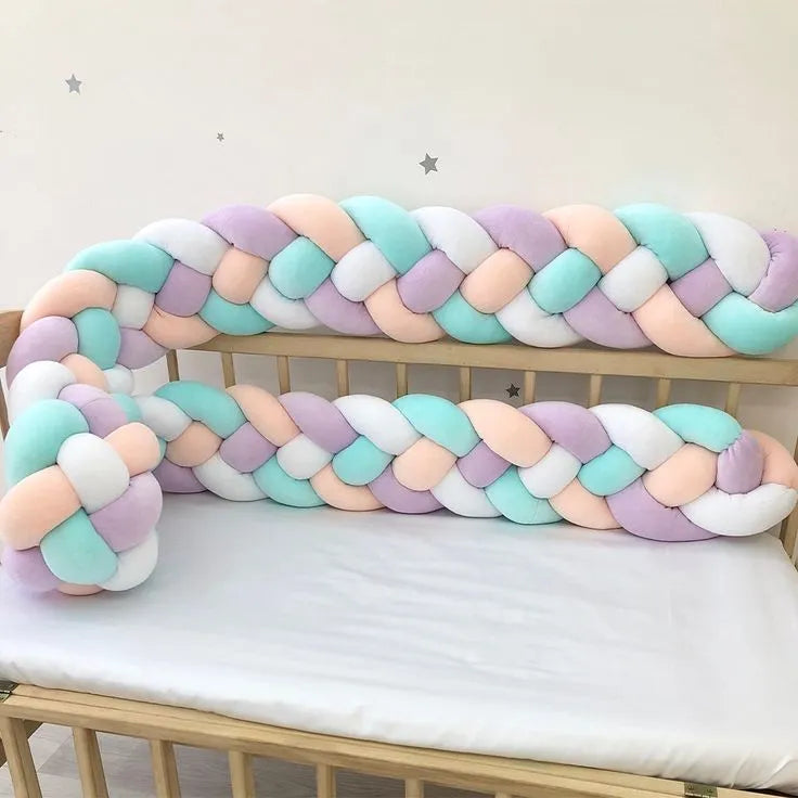 4 strand braided crib bumper blush mint white purple on natural wood crib rail, pastel nursery