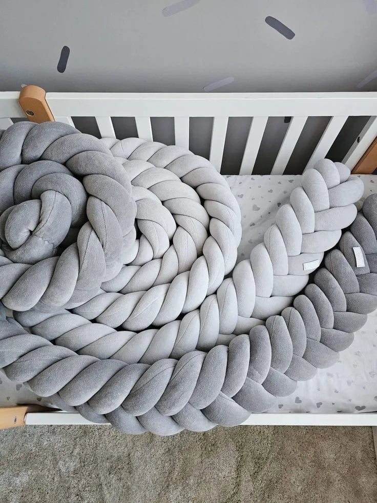 gray mermaid braided crib bumper top view white crib heart print sheet