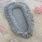 Light blue ruffled organic cotton baby nest, gender neutral newborn lounger, hypoallergenic fill