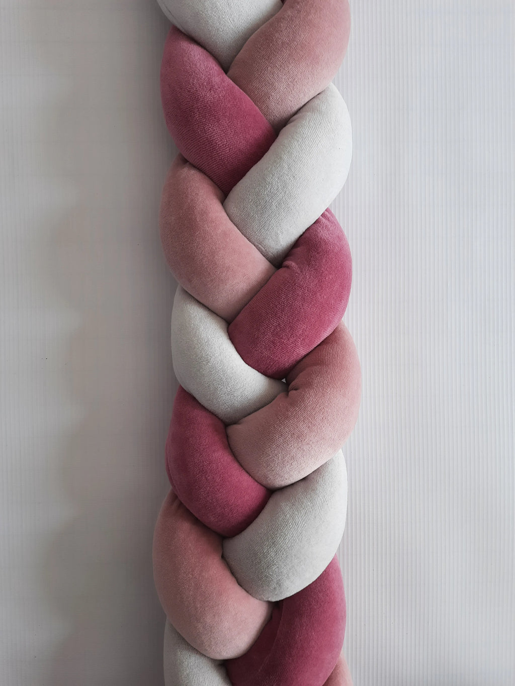 White pink rose 3-strand braided crib bumper close-up, OEKO-TEX certified cotton velour, baby girl nursery