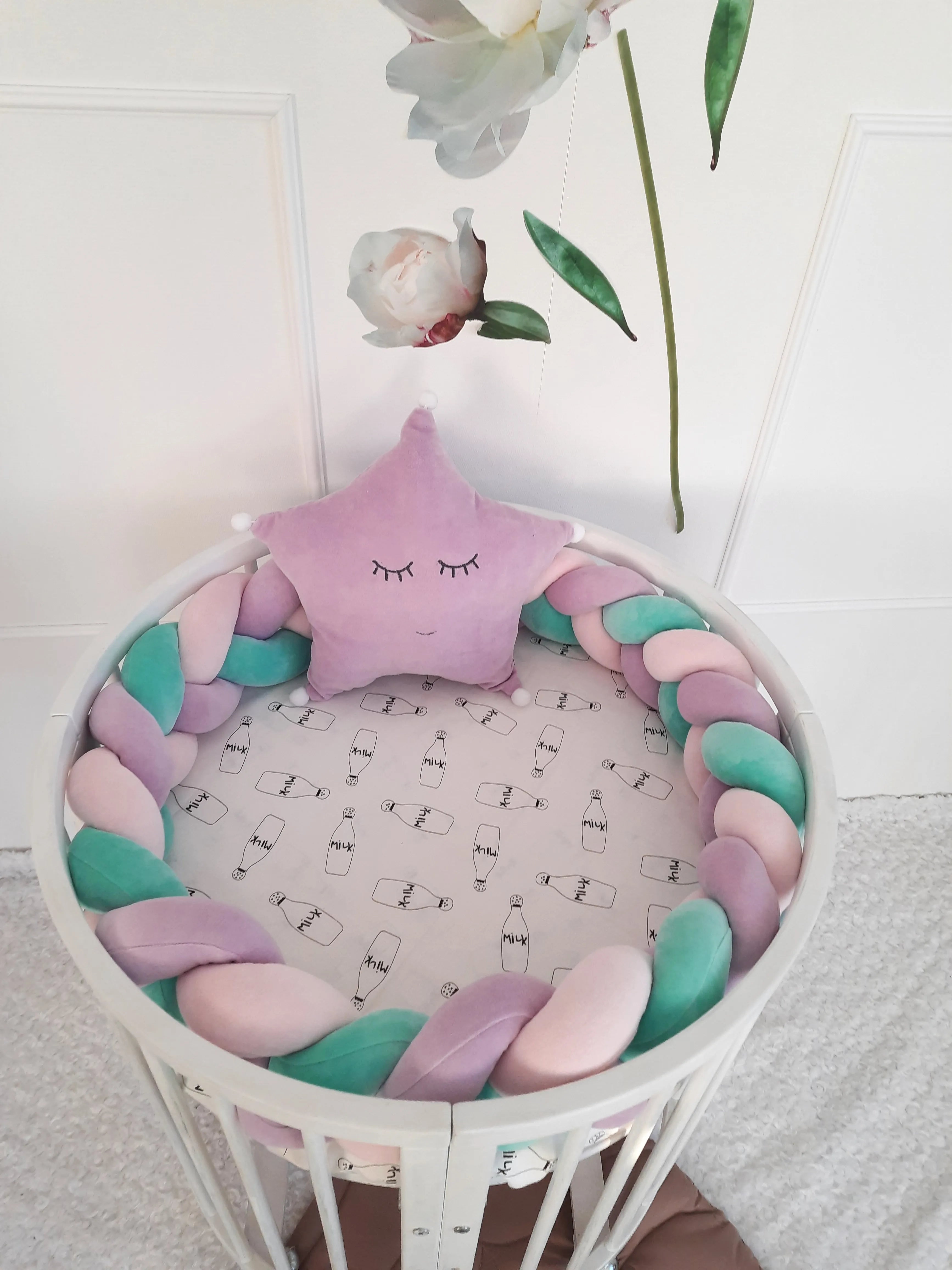 3 strand braided crib bumper purple mint pink in round white crib, star pillow, colorful nursery