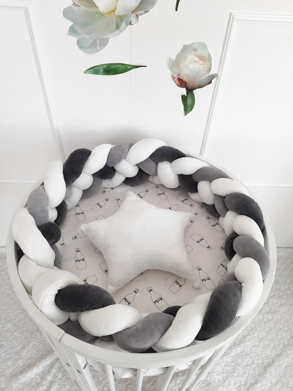 4 strand braided crib bumper white gray in round white crib top view, star pillow, gender neutral nursery
