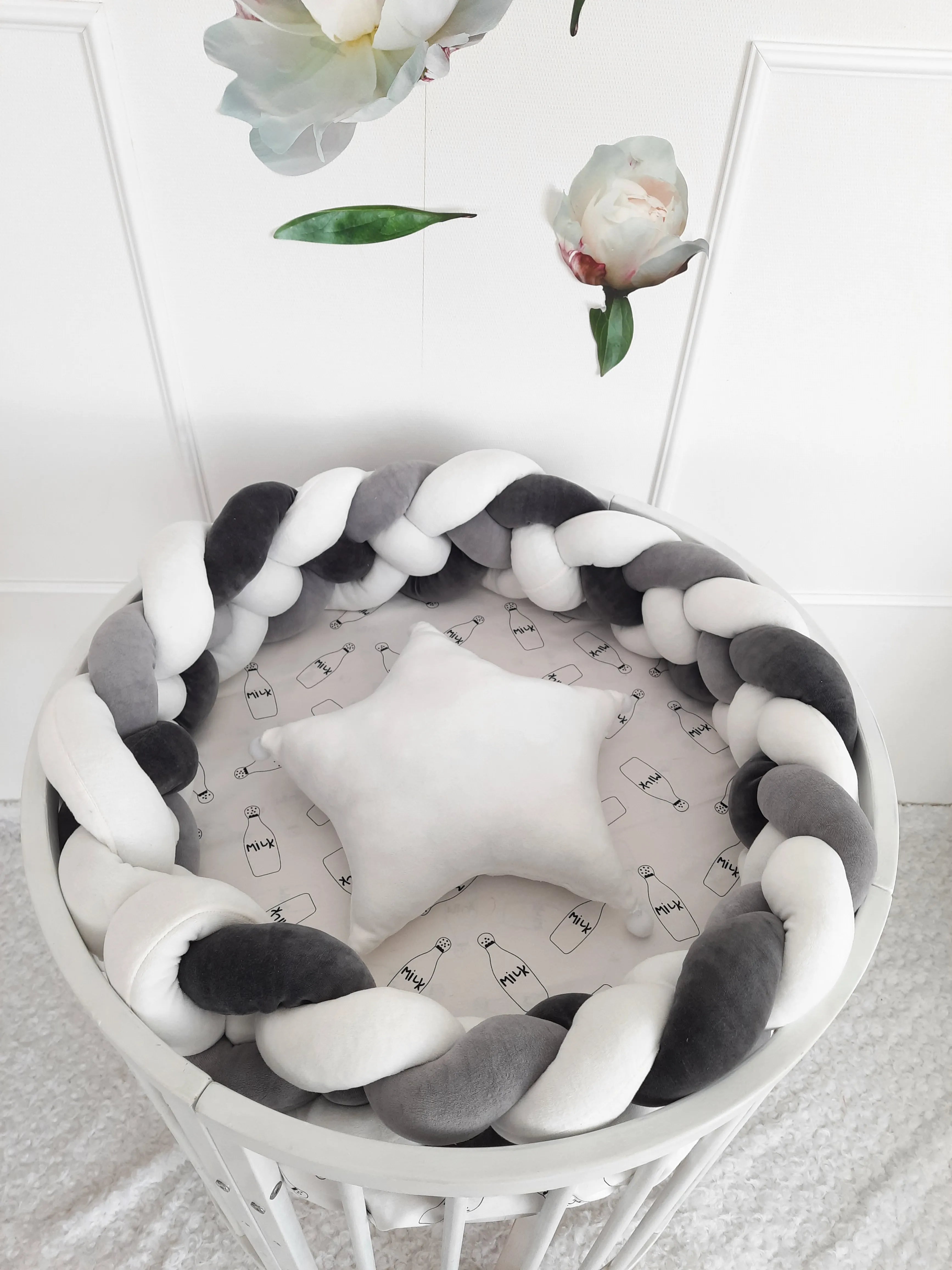 4 strand braided crib bumper white gray in round white crib top view, star pillow, gender neutral nursery