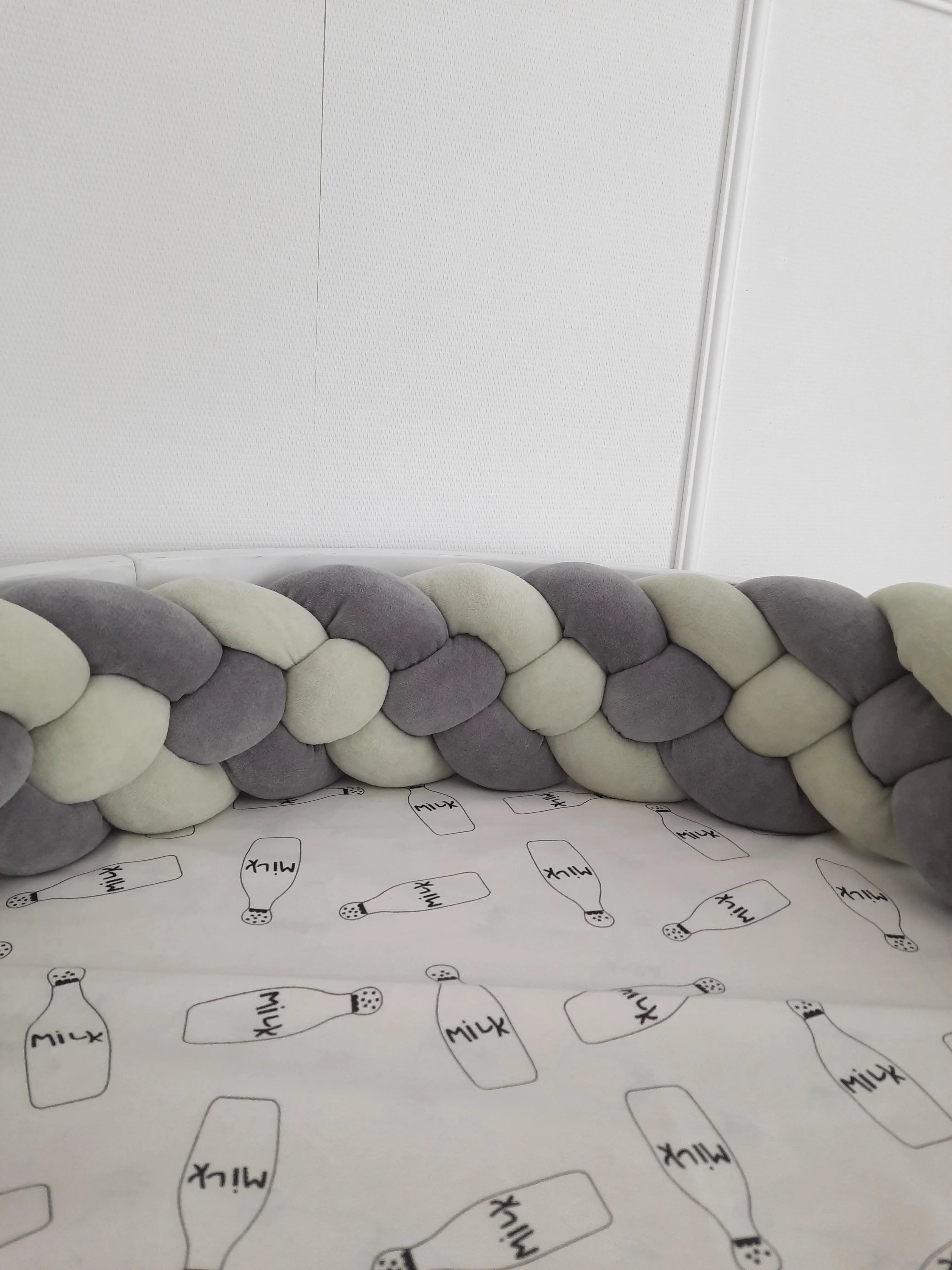 4 strand braided crib bumper dark gray ivory in white round crib, gender neutral nursery