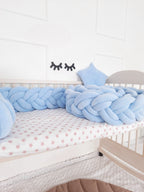 solid light blue double braided crib bumper in natural wood standard crib, boy nursery, OEKO-TEX cotton