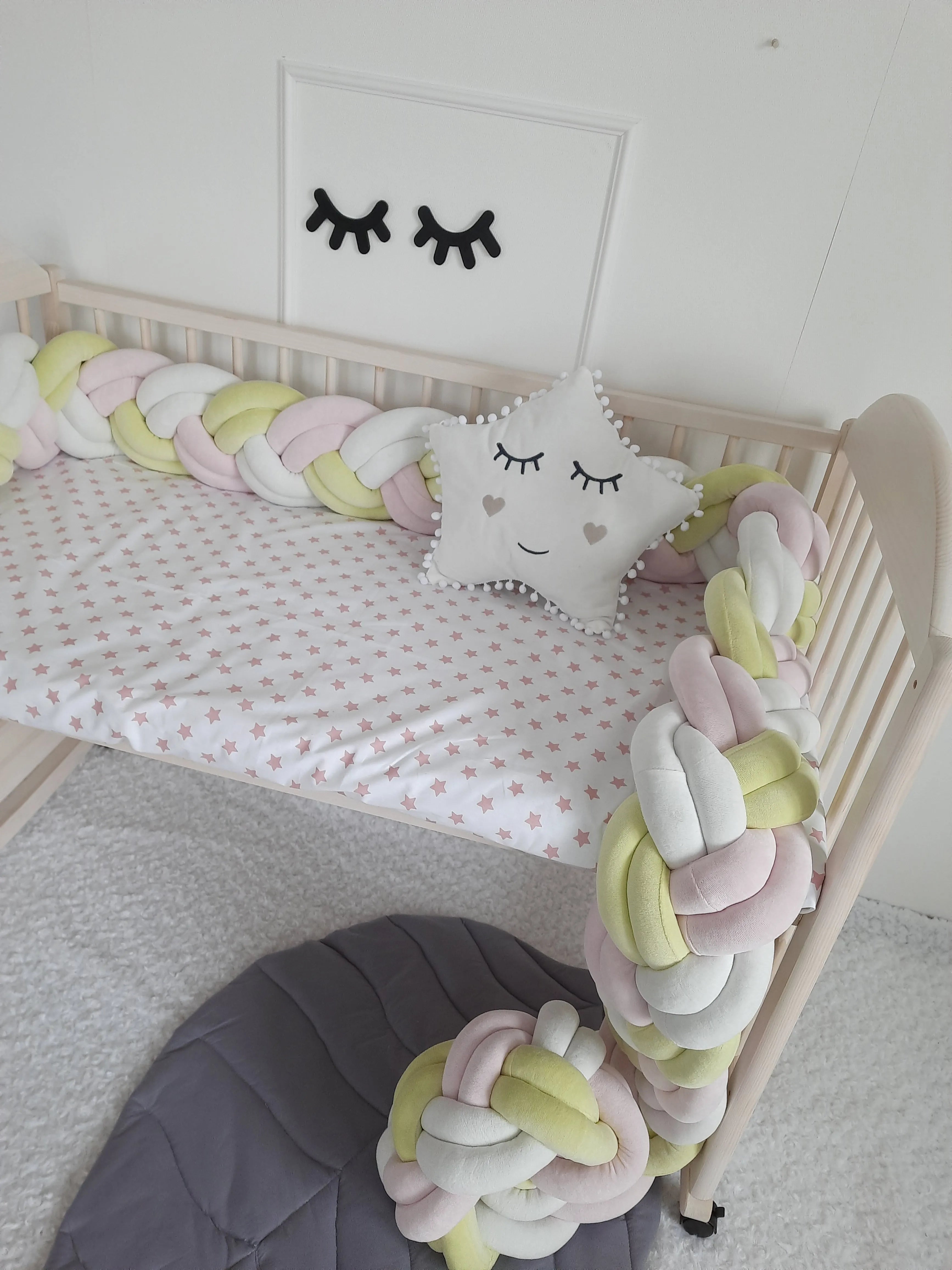double braided crib rail cover yellow pink milk in natural wood standard crib, star pillow, pastel nursery