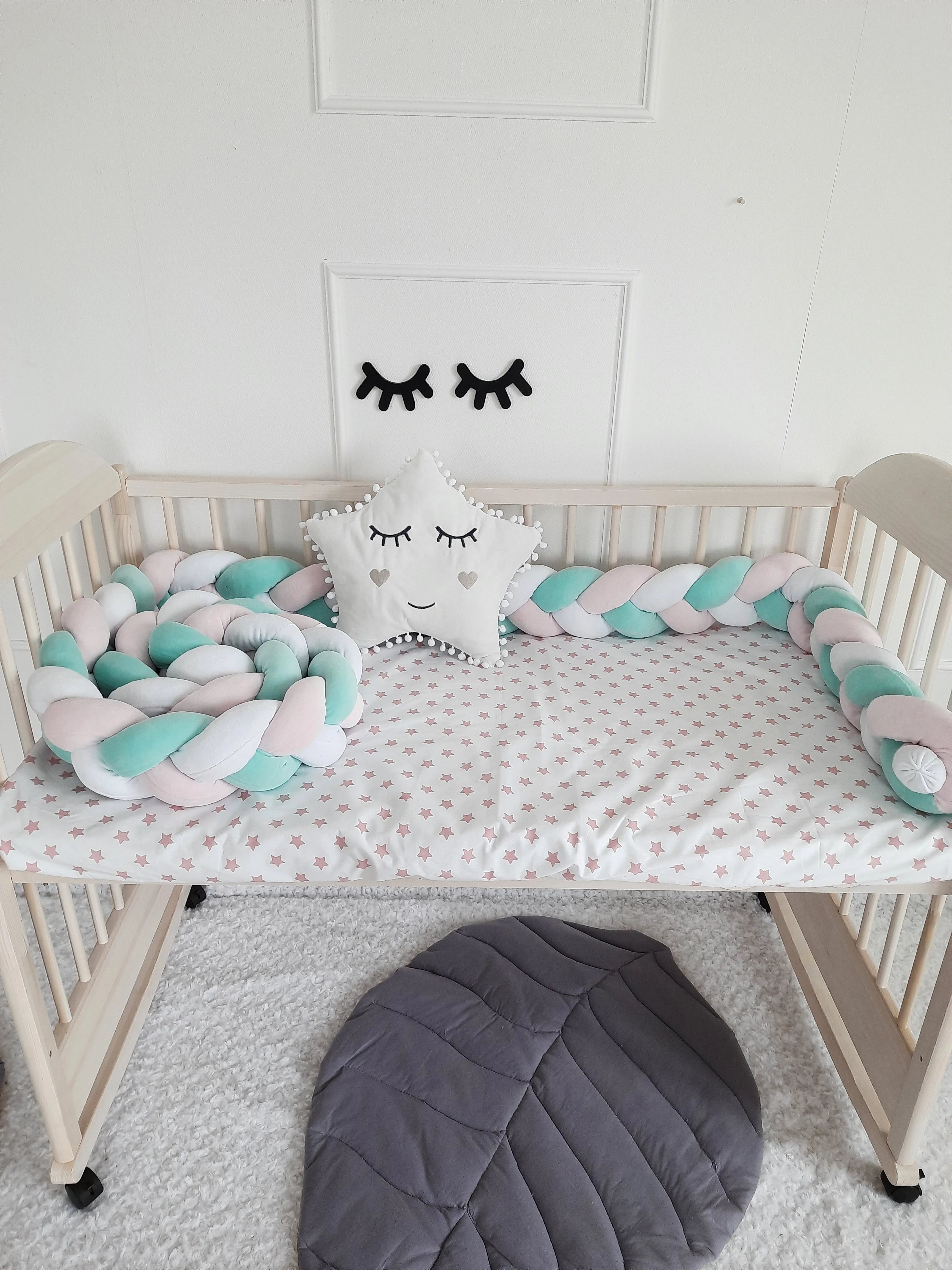 3 strand braided crib bumper mint pink white in standard natural wood crib, scandi nursery decor