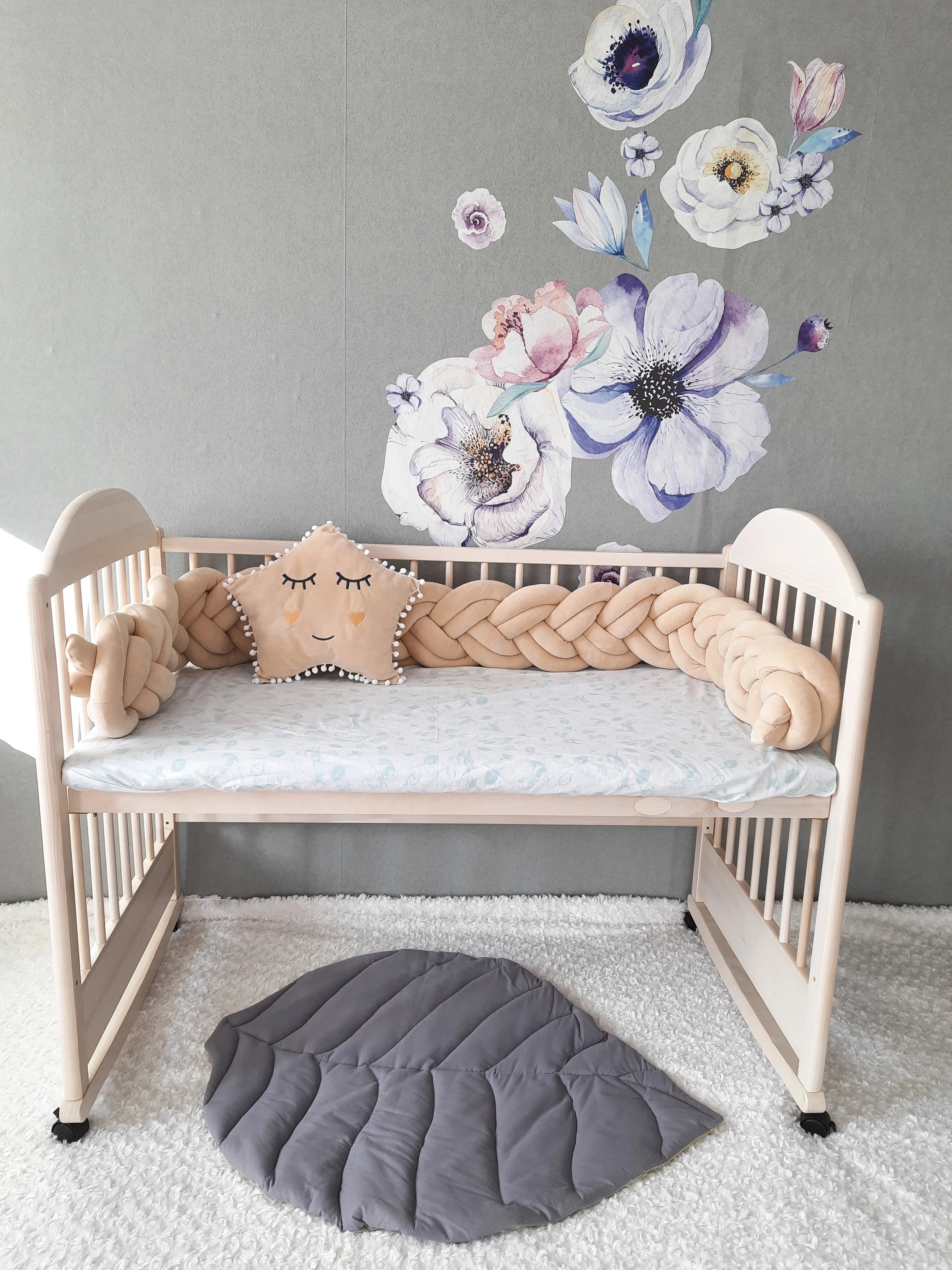 double braided crib bumper vanilla beige in natural wood crib, floral wall decor, neutral nursery