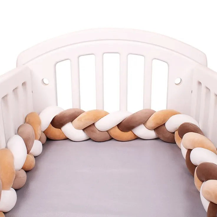 White cream brown 3-strand braided crib bumper installed in white round crib, handmade cotton crib rail protection