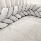 light gray mermaid braided crib bumper close-up cotton velour texture crib slats