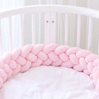 solid light pink 4 strand braided crib bumper in white round crib, girl nursery, OEKO-TEX cotton