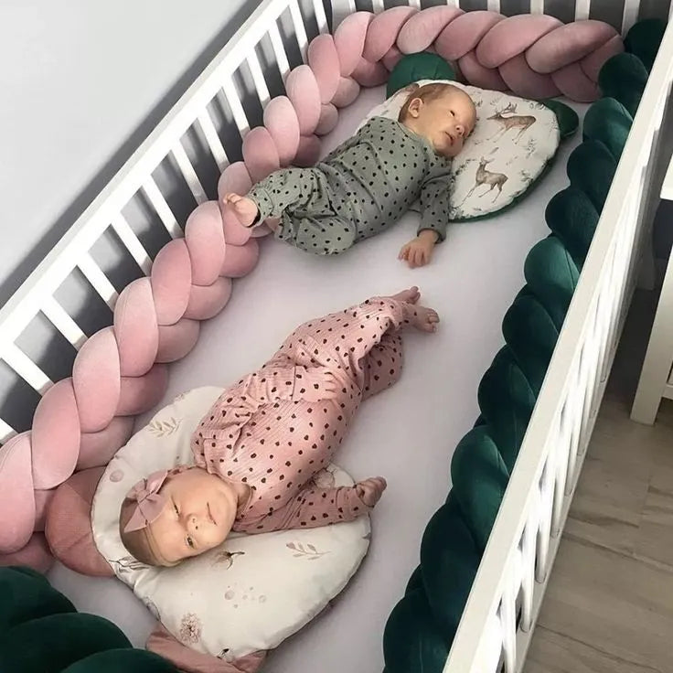 Rose gold and dark green 3-strand braided crib bumper with two babies sleeping, handmade cotton crib rail protection