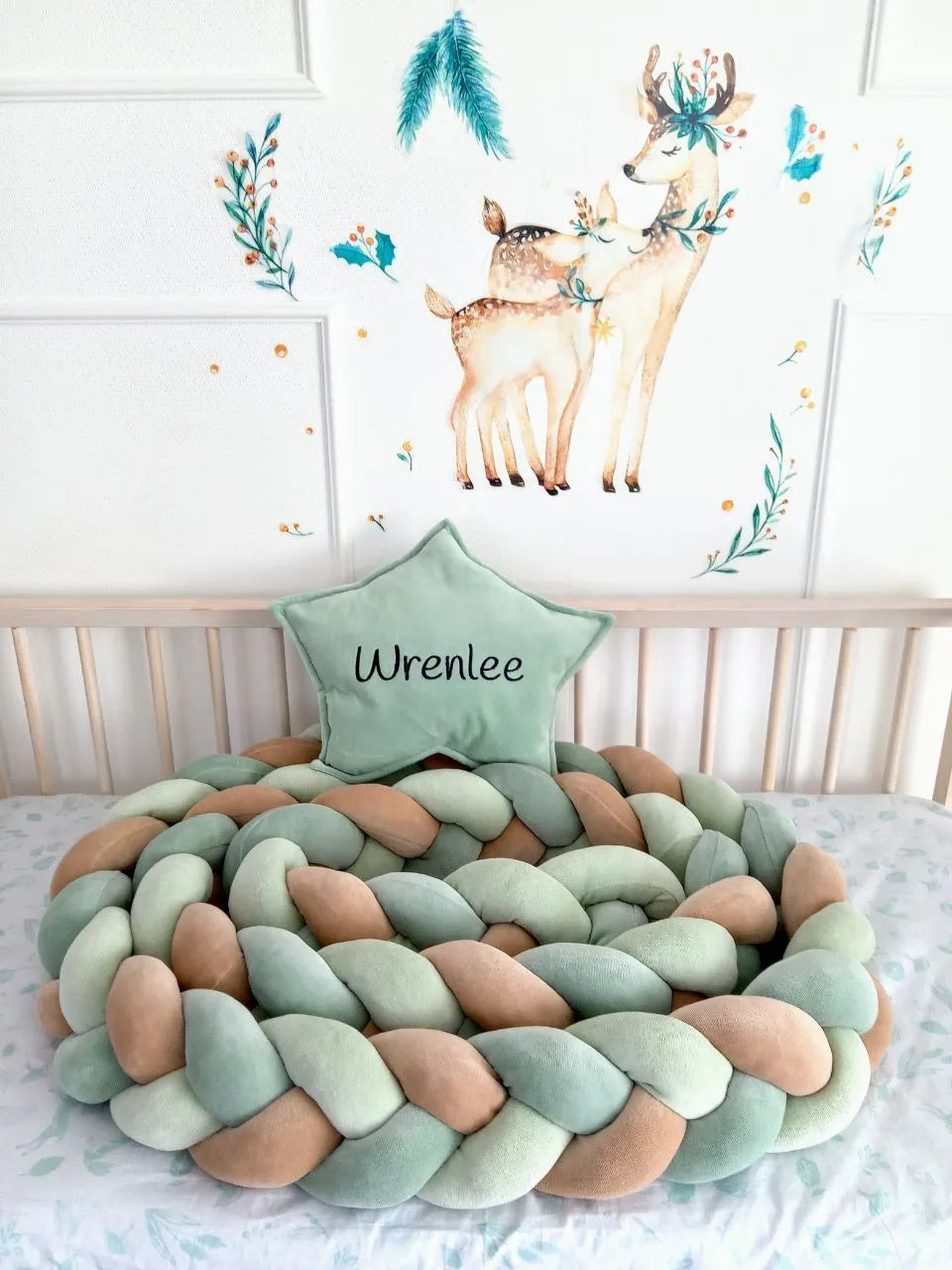 Dark olive light olive cream 3-strand braided crib bumper in wooden crib with personalized star pillow, custom nursery decor