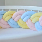 close up double braided crib bumper yellow blue pink pastel cotton velour texture, handmade baby bumper