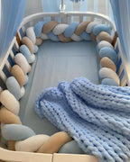 3 strand braided crib bumper blue cream white in oval crib with canopy, boy nursery
