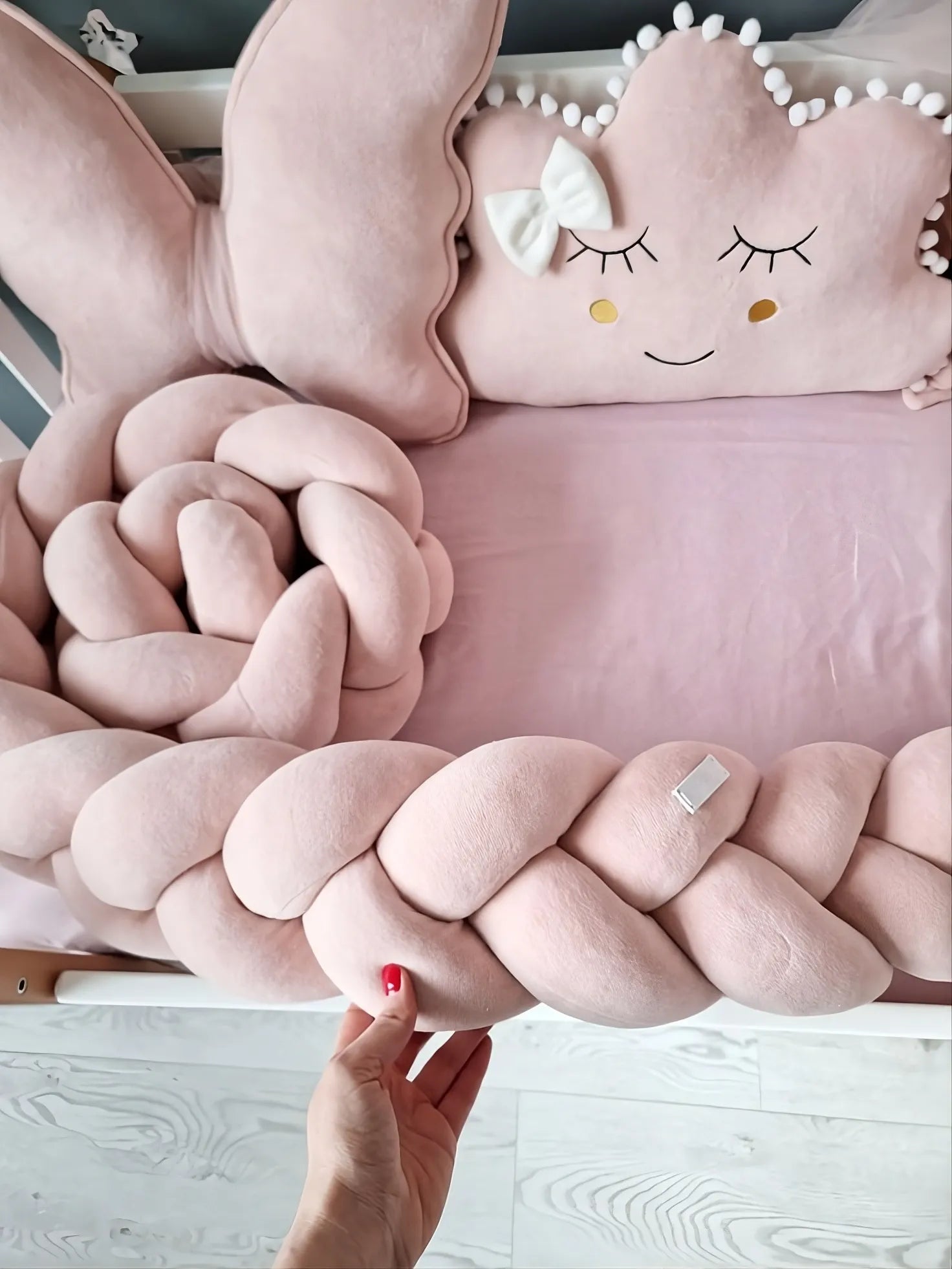 handmade braided crib bumper in rose color, cotton velour close up, safe for newborns