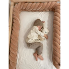 caramel mermaid braided crib bumper toddler bed top view baby sleeping