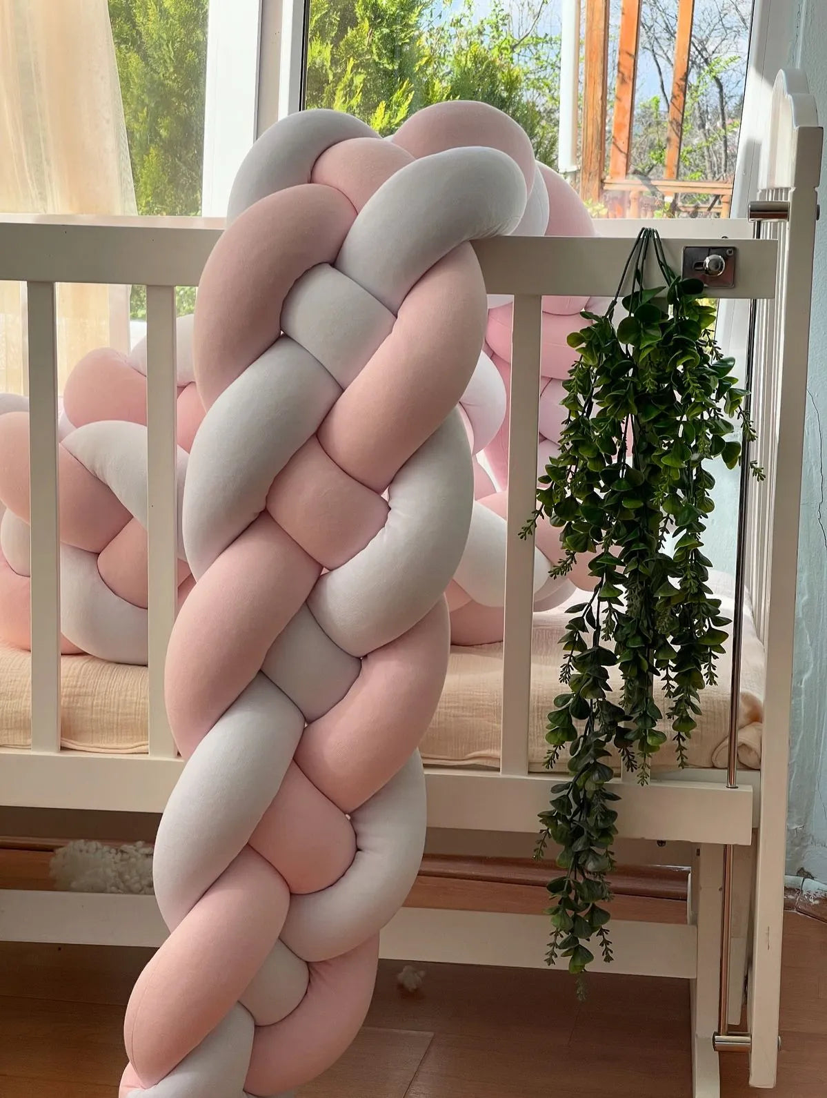 close up 4 strand braided crib bumper blush white cotton velour texture, handmade hypoallergenic baby bumper