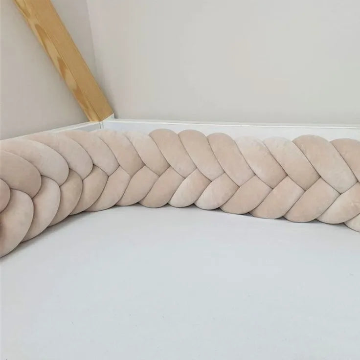 beige mermaid braided crib bumper round crib close-up cotton velour neutral nursery