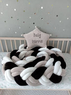 double braided crib bumper black white gray coiled in natural wood crib, modern gender neutral nursery