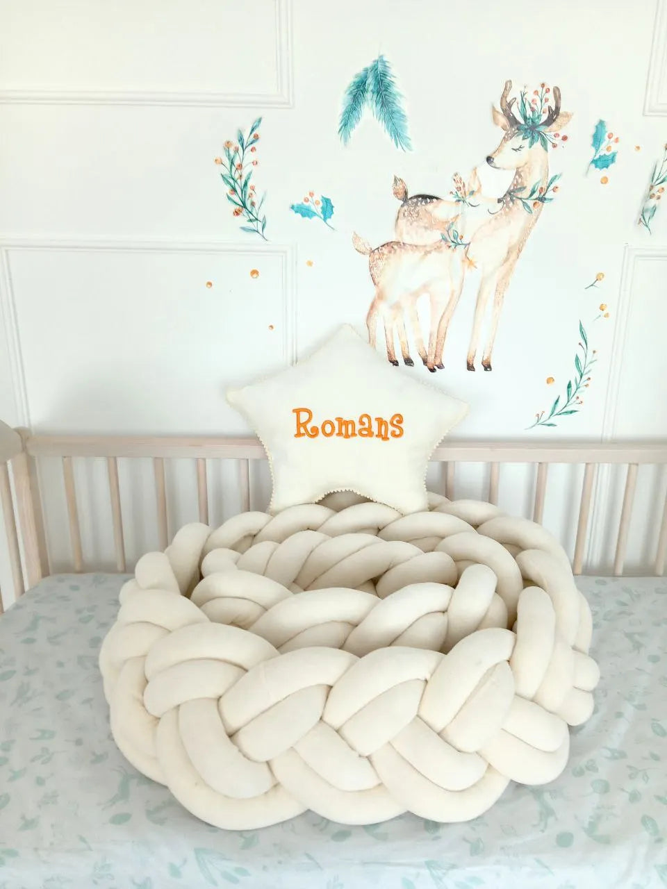 solid cream double braided crib bumper coiled in natural wood crib, deer wall decor, boho nursery